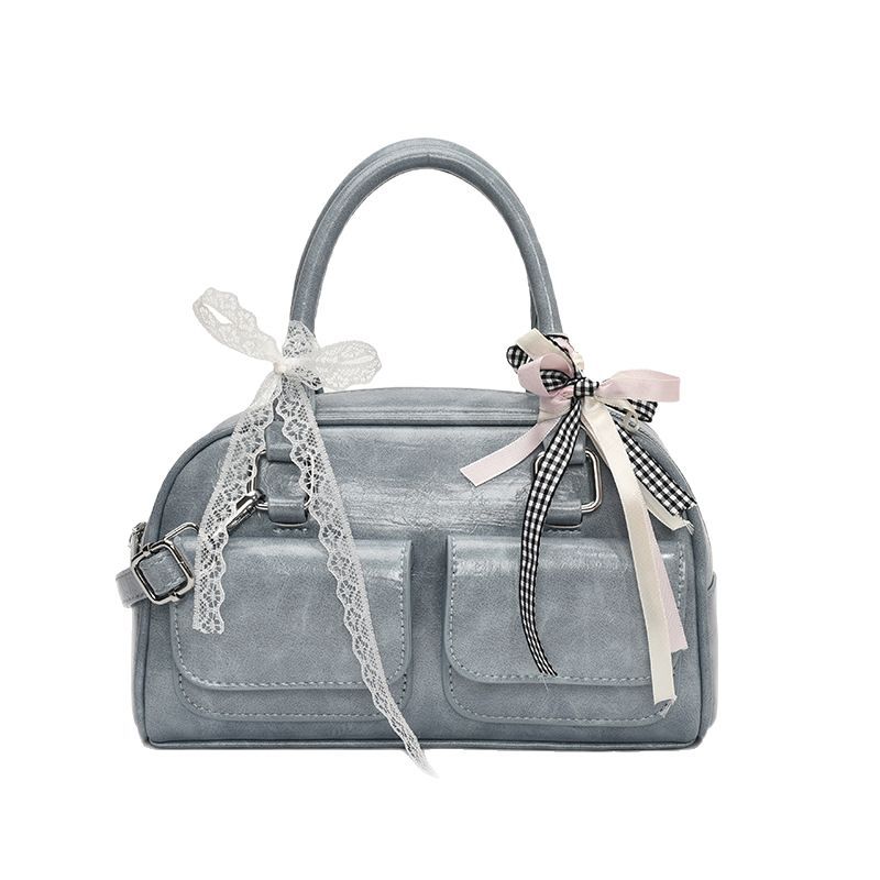 Versatile Korean version ins fashionable new portable Boston bag foreign style solid color oily skin niche simple messenger women's bag