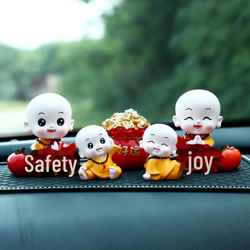 Creative Little Monk Maitreya Buddha Car Ornament: Cute, Shaking Head Resin Doll for Car Interior Decoration and Safety.