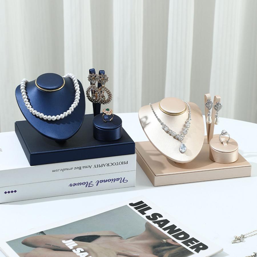 Modisches PU-Leder-Kombinationsset Schmuckständer Anhänger Halskette Ohrringe Ring Display Lagerständer Theken Vitrine Requisiten