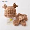 Autumn and winter baby hat scarf two-piece set super cute children's knitted tire hat bear warm ear hat