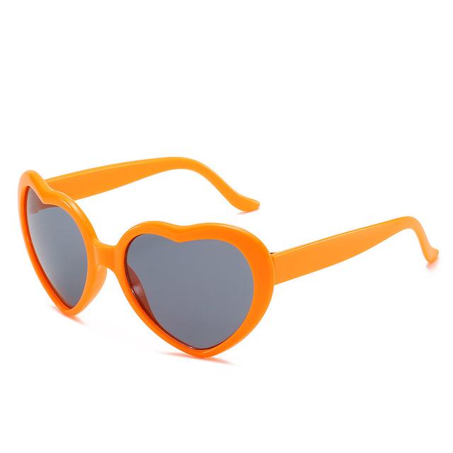 Peach heart Sunglasses love Sunglasses European and American trend frameless conjoined Sunglasses dazzling color glasses