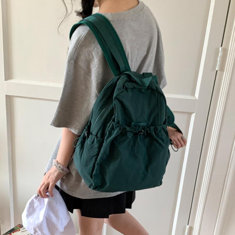 

Korean version of college style backpack bag women s 2025 new nylon canvas bag large-capacity student schoolbag travel bag зелёный