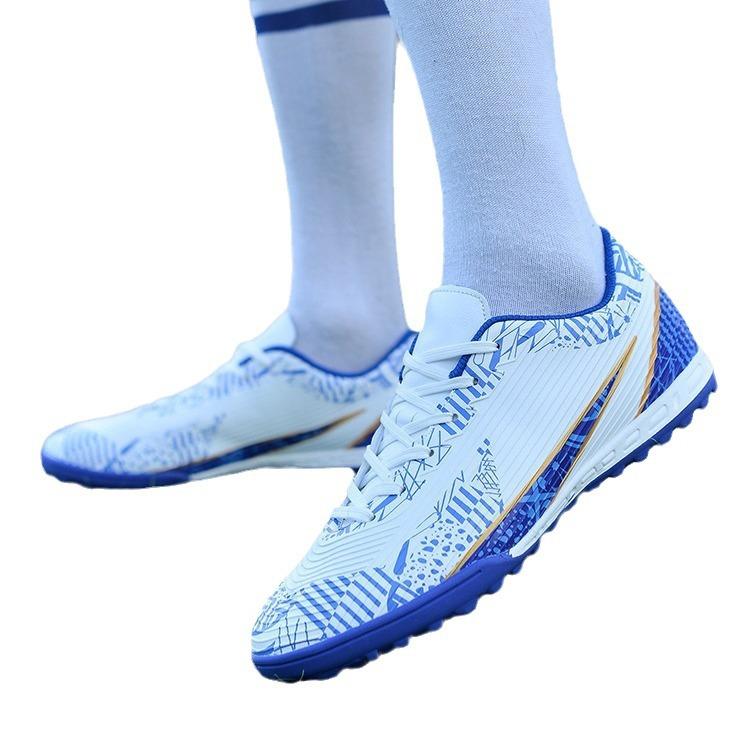 Ronaldo Fußballschuhe mit niedrigem Schaft, Herren- und Kinder-Nockenschuhe, Jinjiang Kunstrasen lange Nocken, Studentenwettkampf-Trainingsschuhe