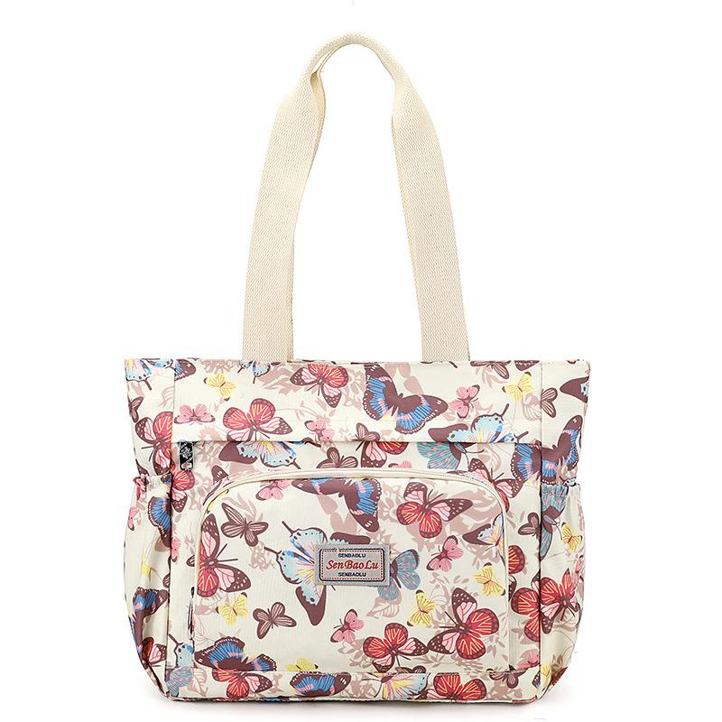 Neue lässige Damen-Umhängetasche mit großem Fassungsvermögen, Reise-Spritzschutz, leichte bedruckte Mutter-Handtasche, Tragetasche, Damentasche