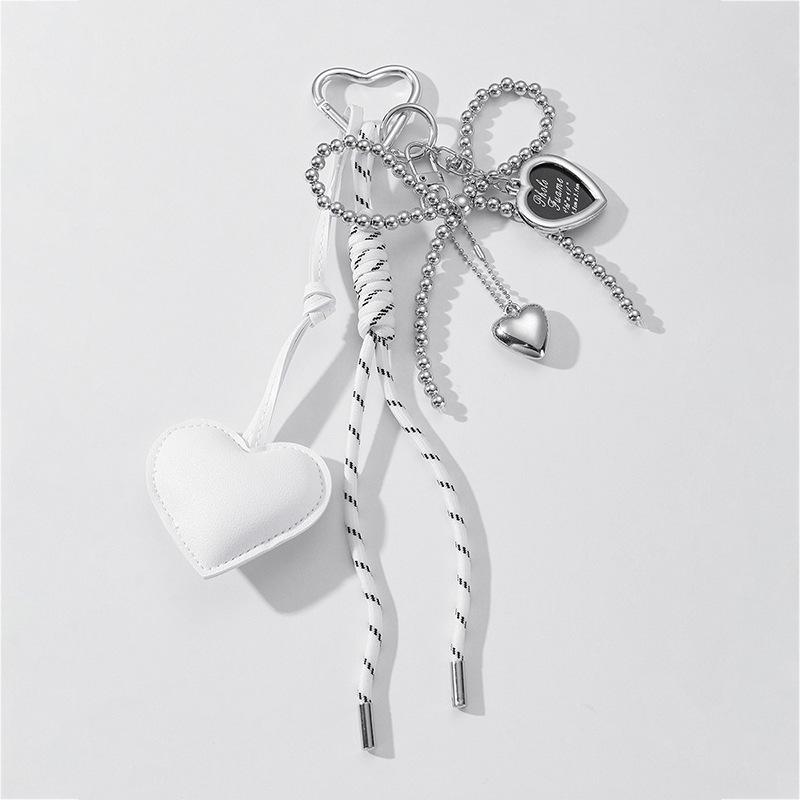 Heart-Shaped Leather Pendant Keychain with Bow and Silver Bead Charm