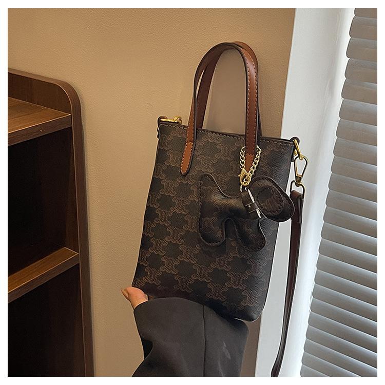 

Маленькая сумка сумка-ведро новая сумочка темпераментная с принтом модная универсальная на плечо мессенджер