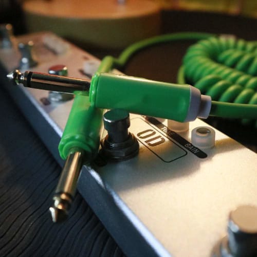 Aestivate 10m Coiled Guitar Cable with Bass Shield and 6.35mm Stereo Plug for Instruments (Green)