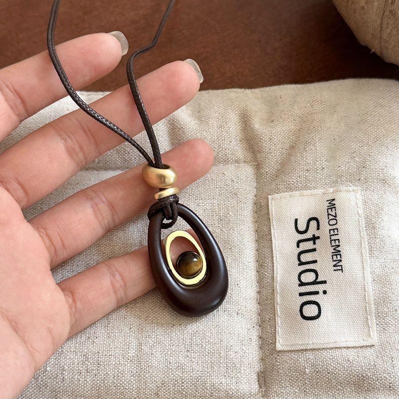 Ожерелье-подвеска овальное из смолы с тигровым глазом, Изысканная высококачественная модная цепочка для свитера с нишевым дизайном