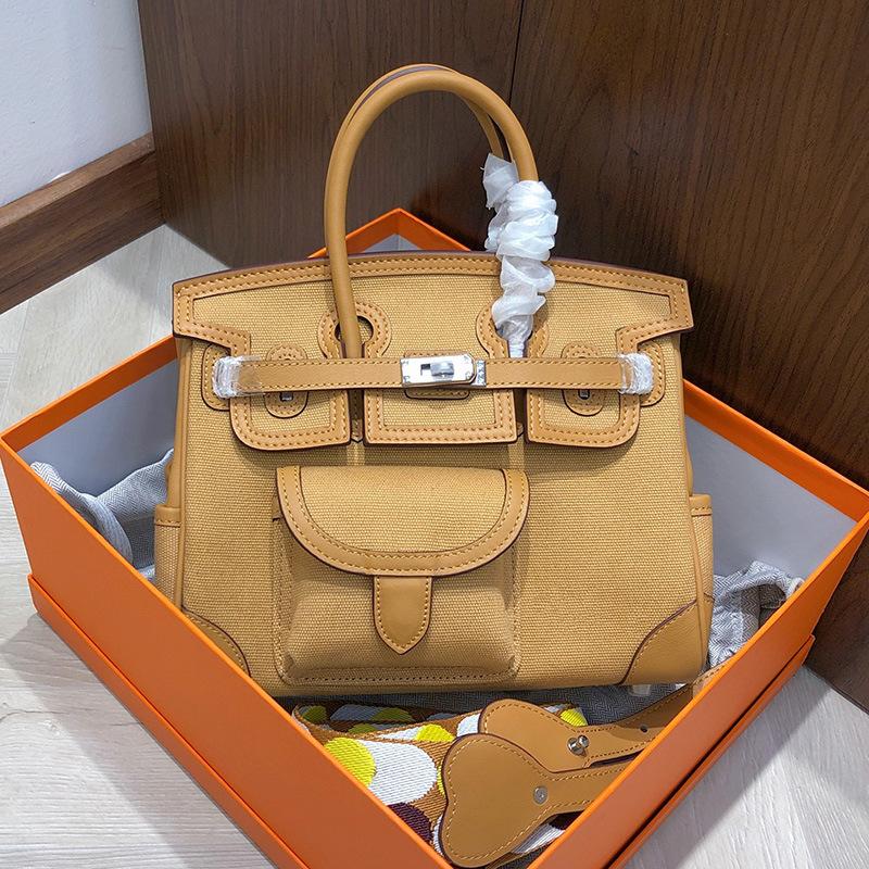 Haute couture version 2025 new cargo platinum bag canvas splicing leather women's handbag shoulder messenger bag