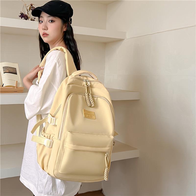 Small and Fresh Middle School Students Backpack Korean Version Large Capacity Lightweight Elementary School Students Casual Backpack