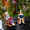 Yousheng 2 Pcs Halloween Rocking Chair Skeleton Elderly Statues Small Reading Knitting Skeleton Figurine Resin Craft for Courtyard Lawn Porch Decor
