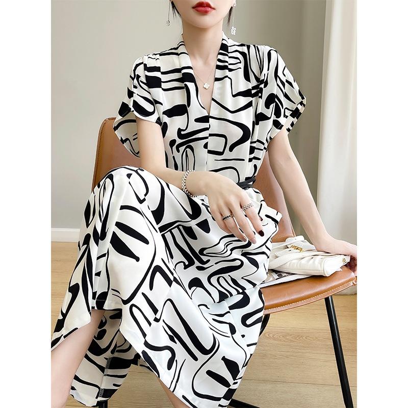 Saténové šaty s kyselinou octovou pro ženy v létě Nový lehký luxus High-end Hedvábná dlouhá sukně Módní a atmosférická tištěná sukně