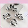 Stylish Korean Cow Print Hair Clips Set Featuring Handcrafted Hollow Design For Women