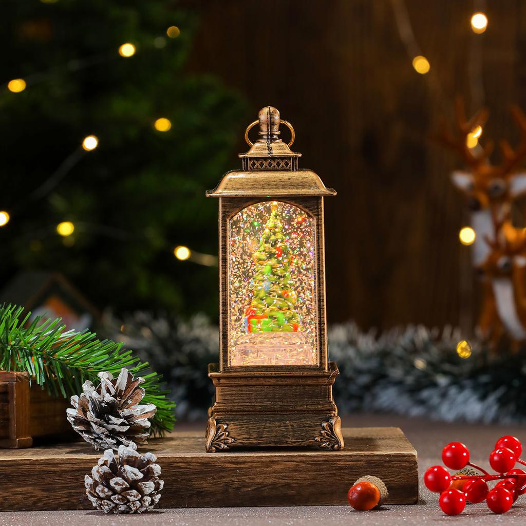 O varietate de apă de Crăciun umplută cu ornamente muzicale, cabine telefonice, lămpi cu ulei, lumini de vânt, decorațiuni de Crăciun, cadouri de Crăciun