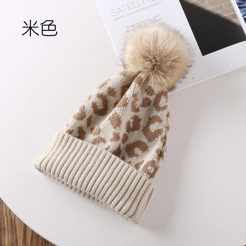 

Outdoor sports and leisure warm knitted hat autumn and winter leopard print hairball wool hat Adjustable бежевий