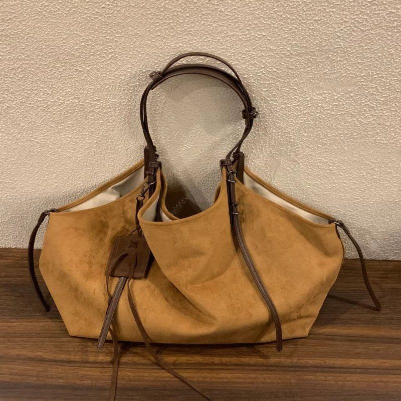 

Korean retro matte suede underarm bag women s 2025 new large-capacity shoulder tote bag commuter computer bag коричневий