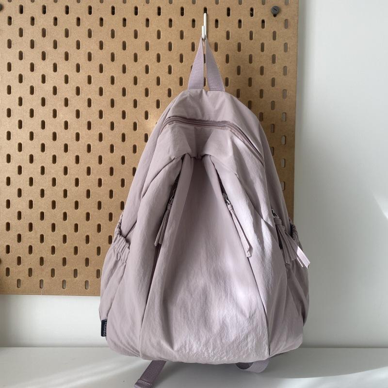 

Travel lightweight advanced sense niche backpack college student commuter junior high school girls schoolbag Japanese and Korean simple backpack No specification