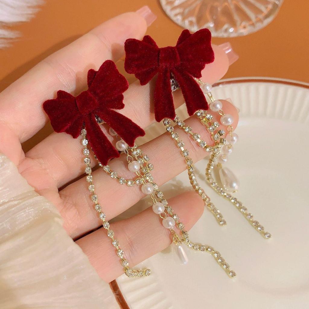 2025 New Year Red Velvet Pearl Earrings: Retro Hong Kong Style Whitening Studs for Women