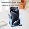 One portable folding phone stand, made of ABS material, suitable for storing and carrying smartphones and tablets.