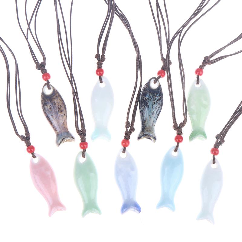 Collane Ciondolo Fischietto Pesce in Ceramica Stile Cinese Fischietto Fatto a Mano Liscio Collana con Fascino Delicato Catena per Maglione Unisex