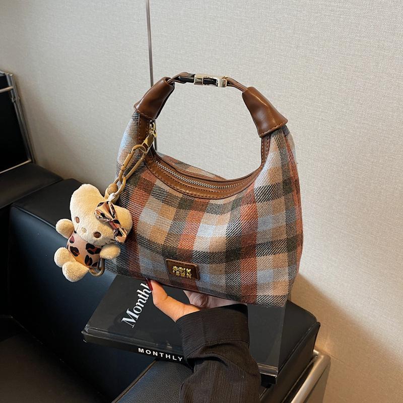 

Премиальная ретро нишевая женская сумочка 2025 новая осенне-зимняя с леопардовым принтом модная универсальная на одно плечо портативная сумка-пельмень No Pendant