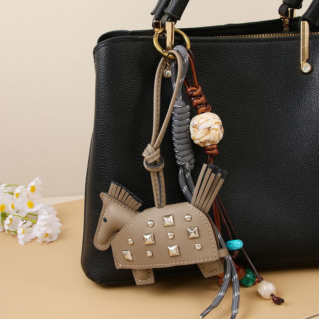 Pony beaded braided rope pendant car pendant key pendant pu leather new rivets war horse bag pendant