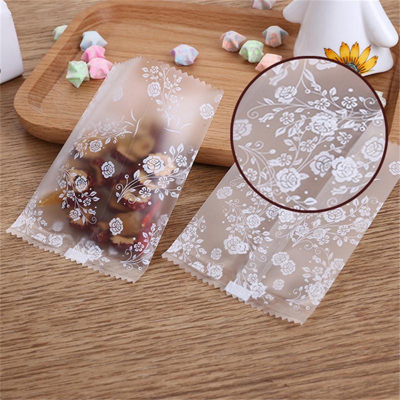 100Pcs Translucent Frosted Rose Flower Pattern Fruit Tea Candy Cookie Machine Sealed Bags Plastic Packaging