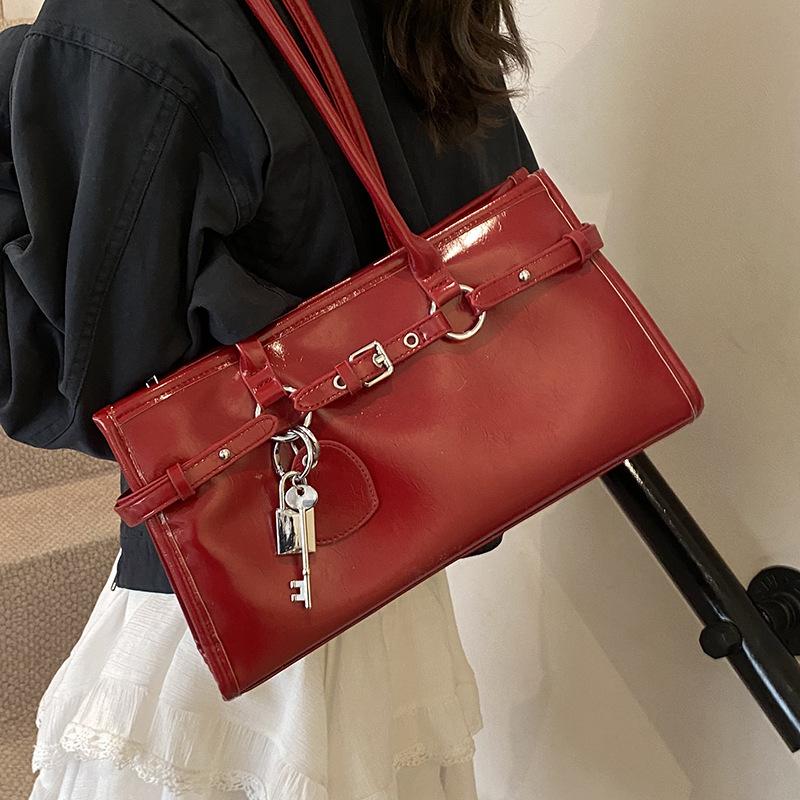 Frühling Neuprodukt Nischendesign personalisierte Ölwachsleder Achsel-Baguettetasche vielseitig Pendeln Temperament tragbare Umhängetasche Damen