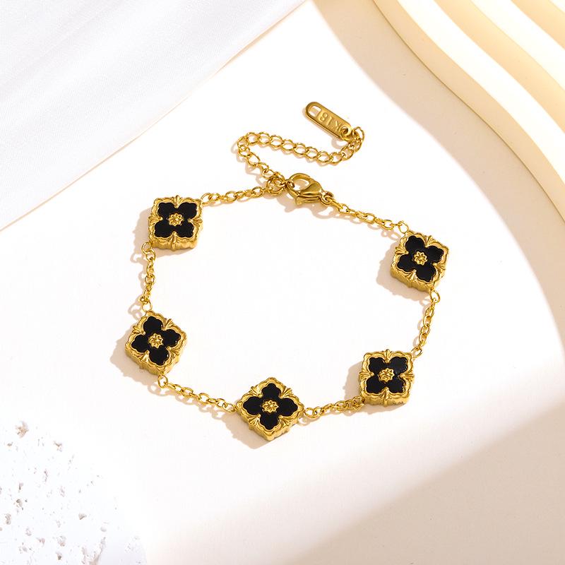 Retro Craftsmanship 18K Titanium Steel Four-Leaf Clover Jewelry Set: Flower Necklace, Bracelet, Earrings.
