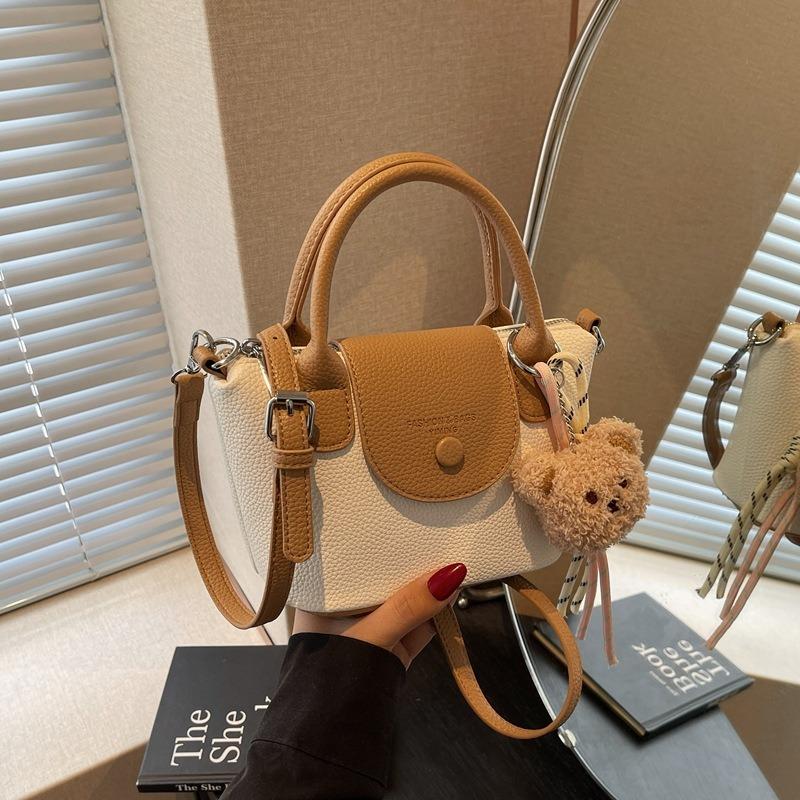 Retro small bag women's spring and summer new handbag high-end simple commuting fashion messenger bucket bag