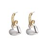 Elegant Two-Tone Heart Hoops: Luxurious, Shiny Metallic Earrings with Unique Niche Design.