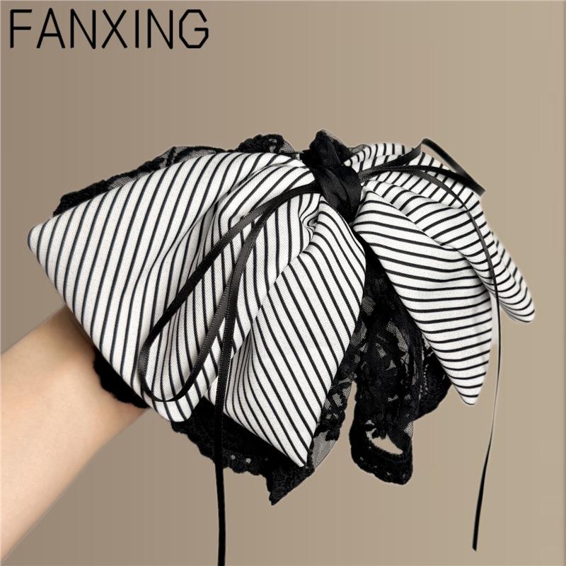 

Women s Stylish Korean Stripe Bow Hair Clip Standard