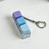 Sleutelhanger voor stressverlichting: Decompressie Kubus met Vier Knoppen & Toetsenbord Hanger