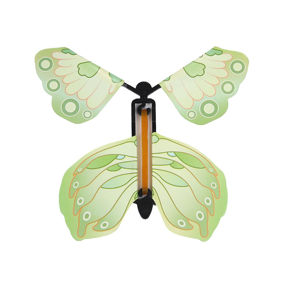 

1Pcs Magic Wind Up Flying Butterfly in The Book Rubber Band Powered Magic Fairy Flying Toy Great Surpris Gift Party Favor