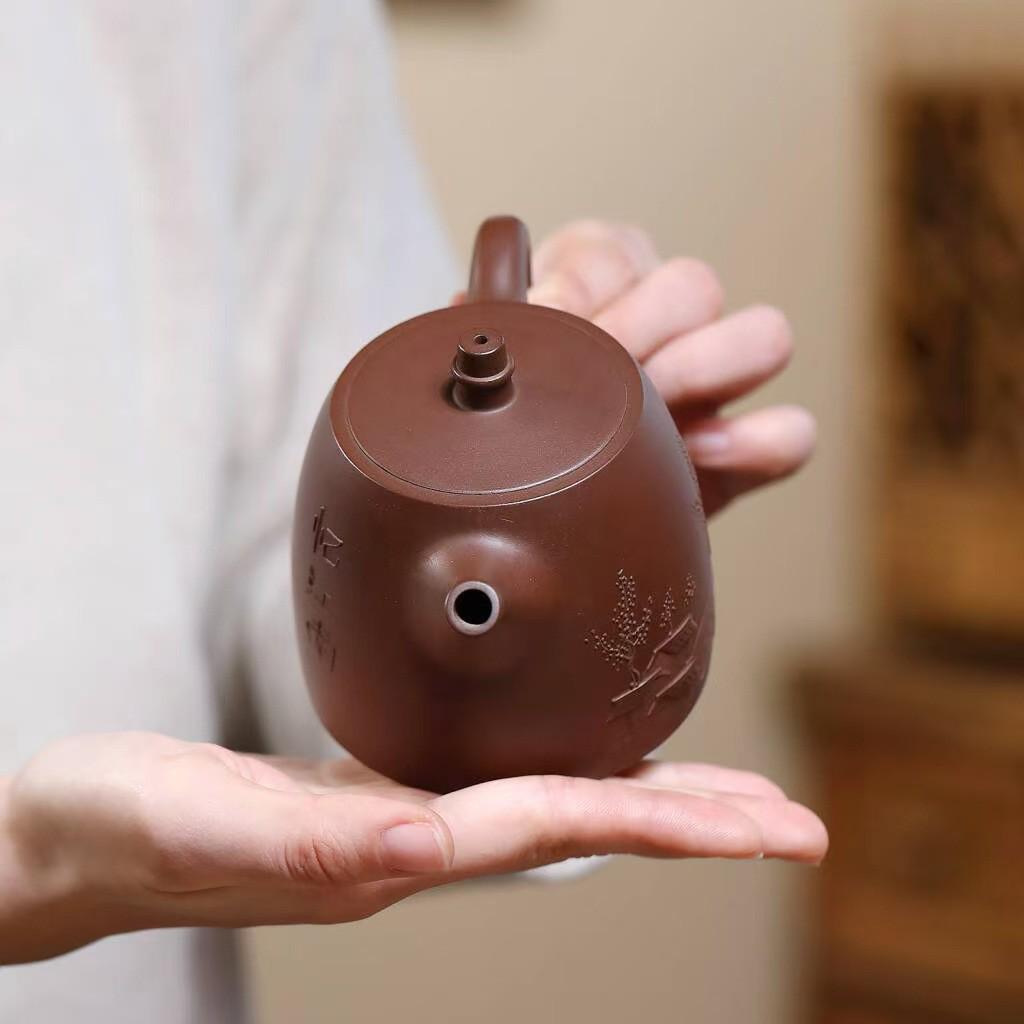 Yixing Zisha Teapot: Handmade, Engraved Han Duo Design with Original Ore Bottom Slot - Clear Tea Set.
