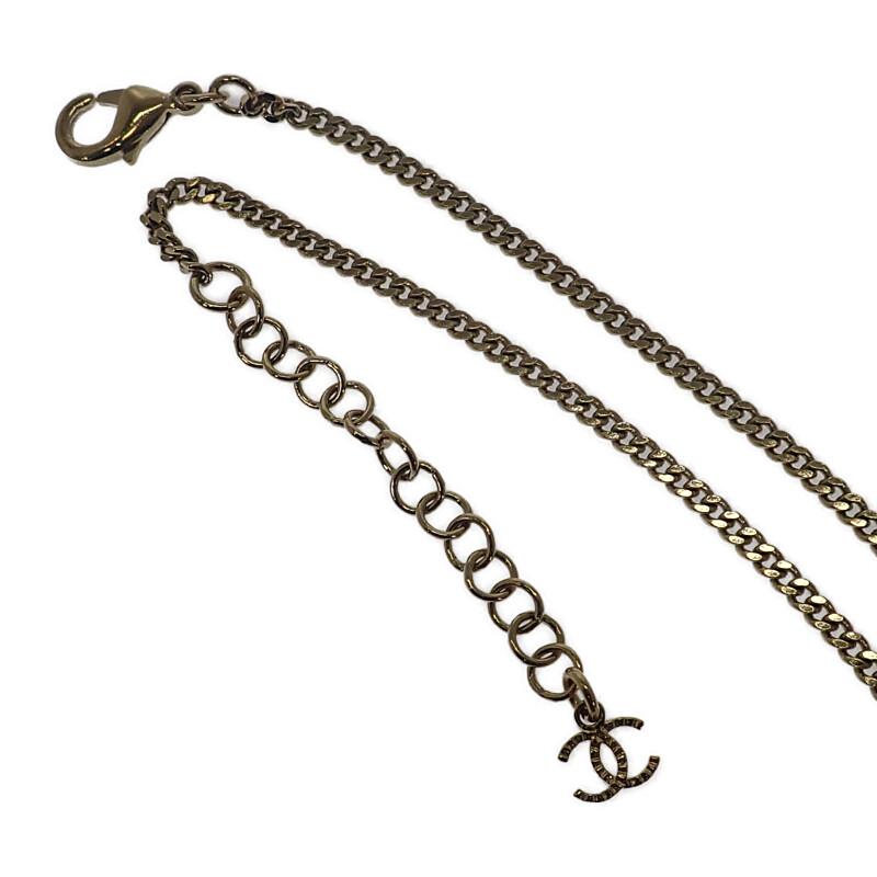 CHANEL  Necklace gold/black metal Women