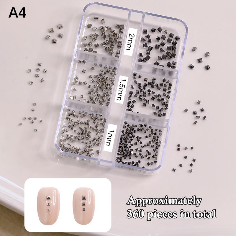 

6 Комірок 3D Міні Панк Металеві Шипи для Нігтів Змішаний Розмір Срібло Золото Чорний Чарівні Елементи для Манікюру Сплав Заклепки Приклеювані Конуси DIY Декор для Рукоділля A4