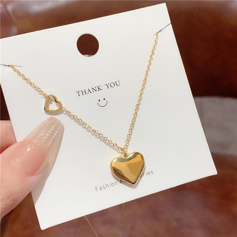 

Fashion sweet non-fading 11K gold electroplated love necklace female Internet celebrity light luxury titanium steel collarb chain peach heart pendant