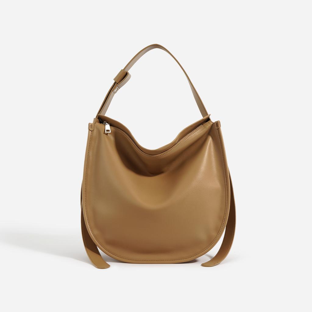 Sac cabas en cuir simple et à la mode Cuir de vachette souple Grande capacité Commuting Polyvalent Simple épaule Bandoulière Sac seau Femmes