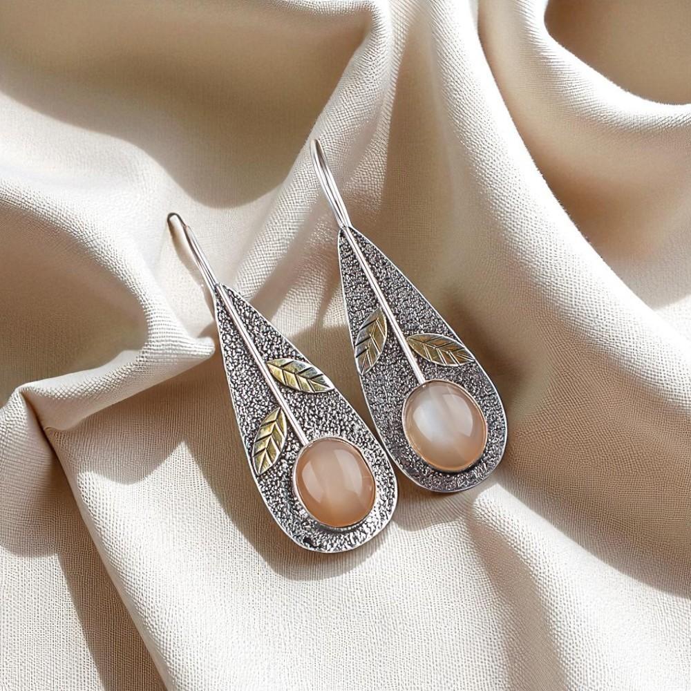 

Редкий драгоценный камень Персиковый Лунный камень Ювелирные изделия из серебра 925 пробы Ручная работа Серьги 2,00 EE-72-29