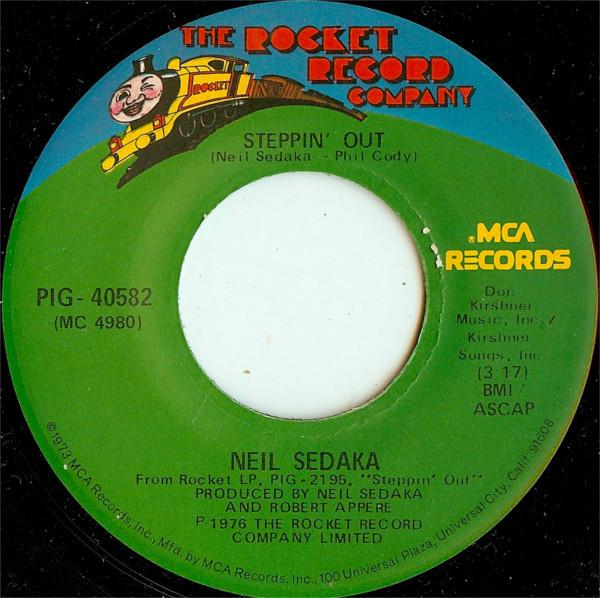 

7inch Record NEIL SEDAKA - Steppin Out PIG40582 The Rocket Reco 1976 US Rock Used