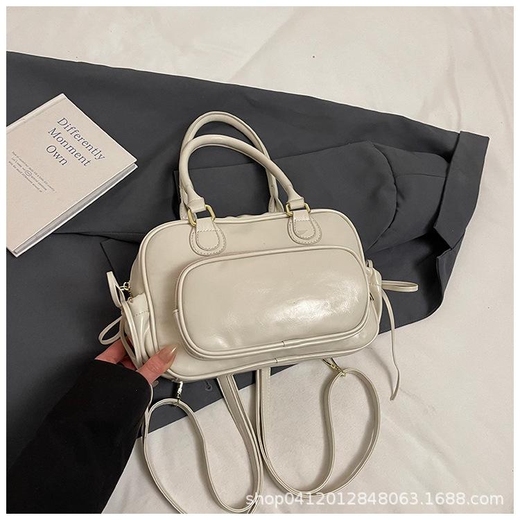 

Stylish simple and high-end retro handbag New fashion niche backpack Multifunctional backpack Bowling bag білий