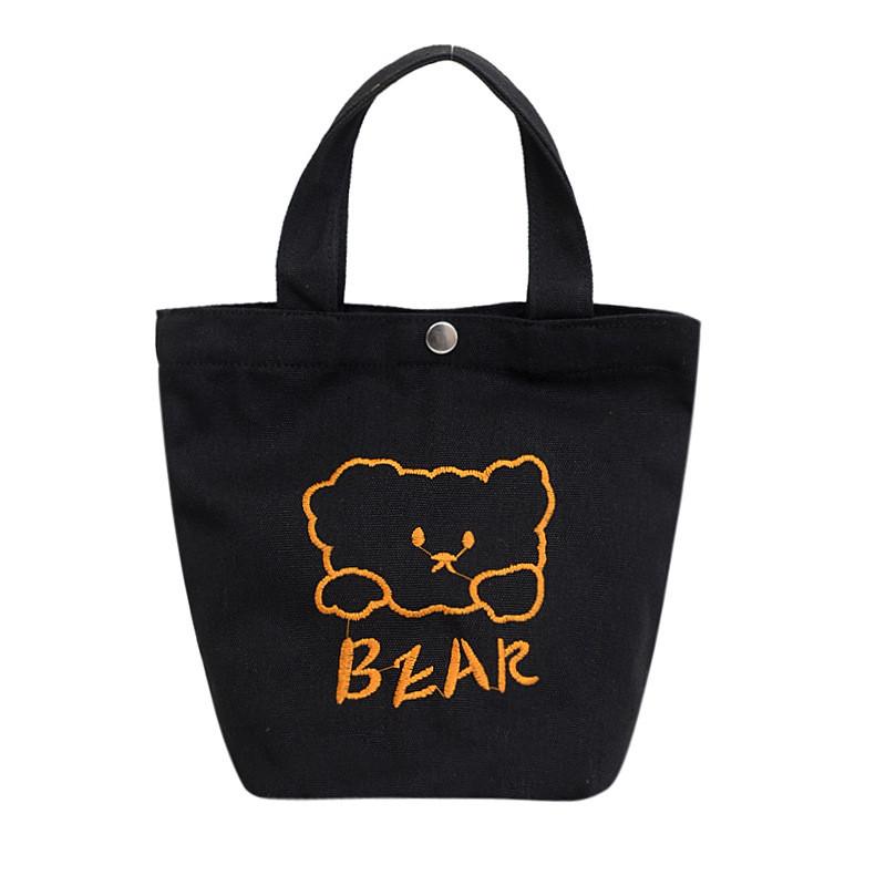 

Street Style Embroidered Canvas Handbag With Magnetic Closure For Everyday Wear чорний
