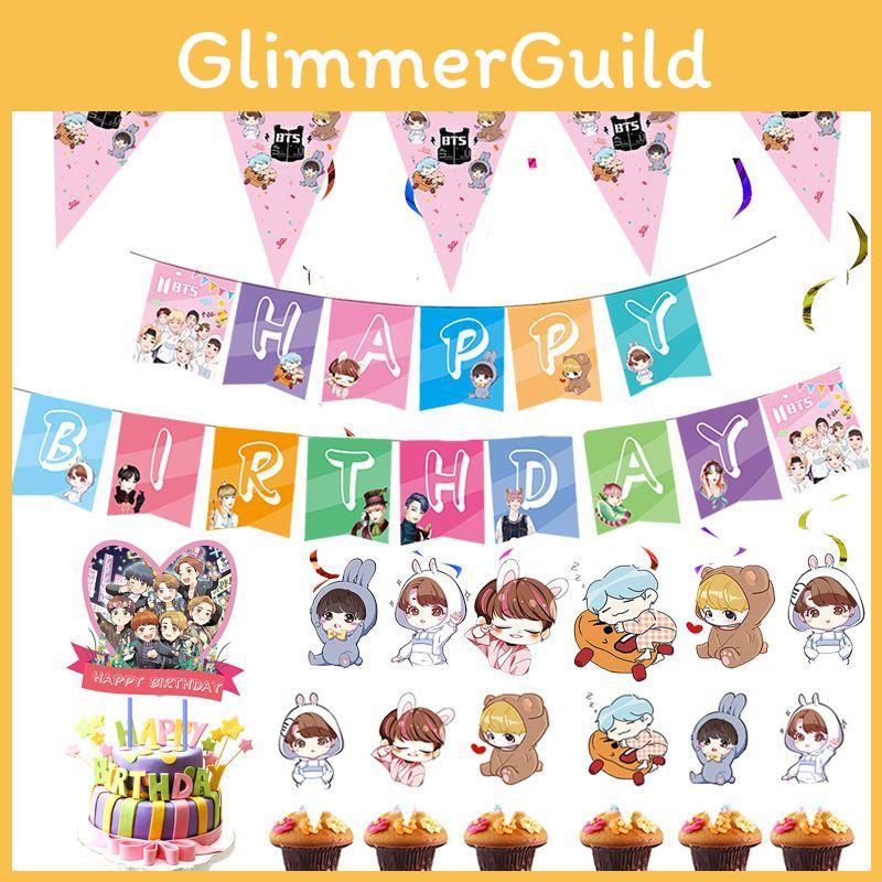 Fournitures de fête d'anniversaire festives sur le thème de BTS avec un cake topper coloré et des cupcake toppers joyeux