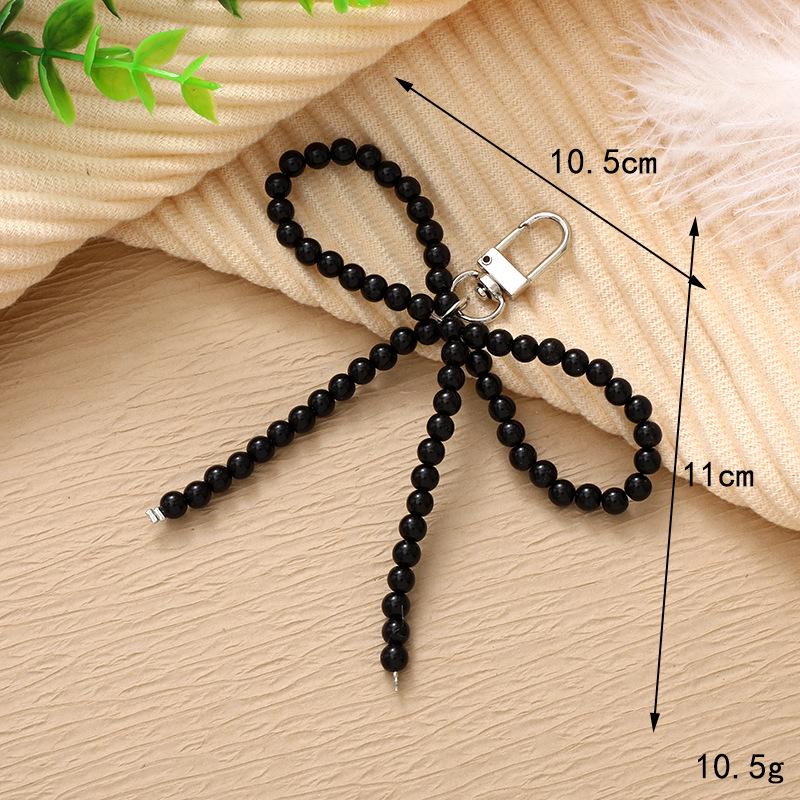 Creative Pearl Bow Pendant Keychain: Exquisite Gift Accessory for Bag or Phone Case