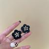 Chessboard flower earrings women's high-end sense cold wind ear jewelry design sense simple and versatile black and white plaid earrings