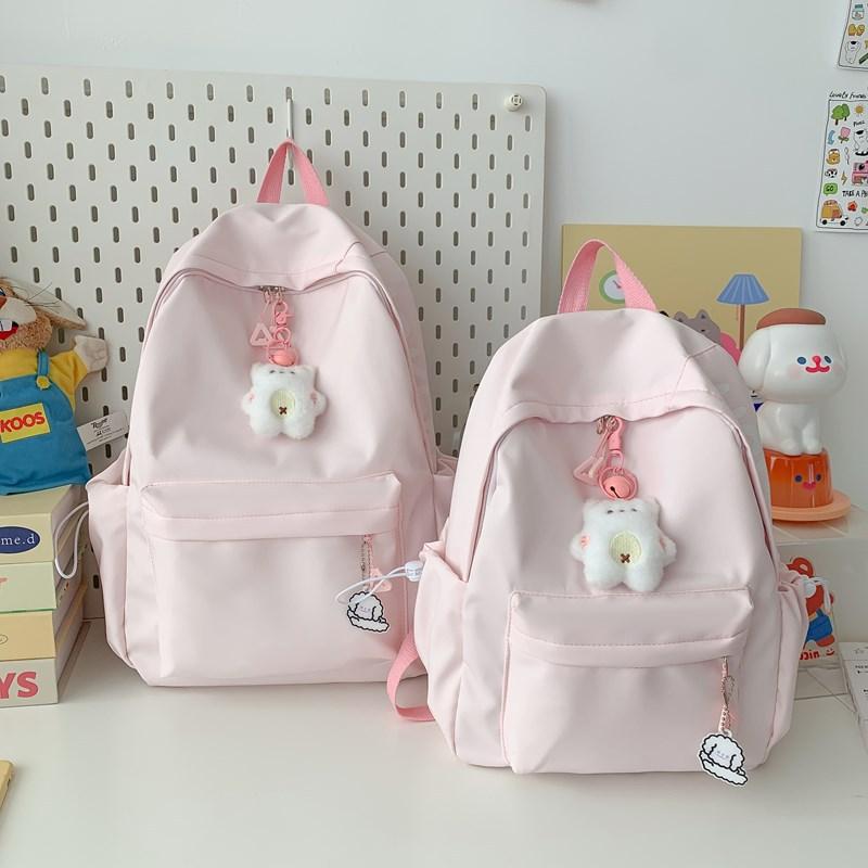 

Women s backpack alphabet casual high-value junior high school college student women s schoolbag ins niche large-capacity backpack Large single bag [without pendant] розовый