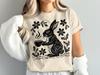 Whimsical Rabbit T-Shirt, Linocut Style Bunny with Steaming Cup, Nature Lover Art Tee, Cottagecore Woodland Animal Gift, Coffee Tea Drinker