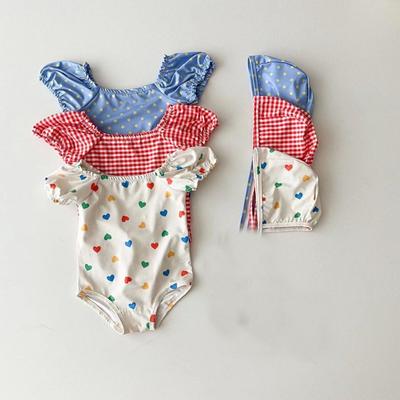 Ins24 Baby Girl Summer Swimsuit Set: Includes Swimsuit, Swimming Cap, Sling Bag, and Romper for Beach Days