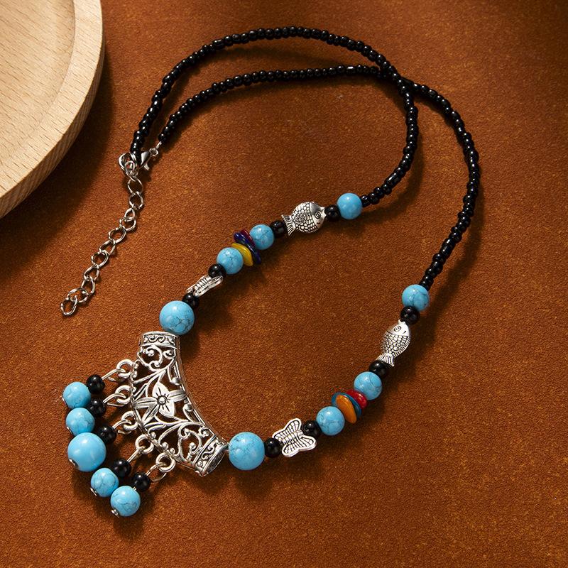 

Этническая цепочка на лоб, головной убор с кисточками и бирюзовыми подвесками между бровями. Экзотический головной убор. синий